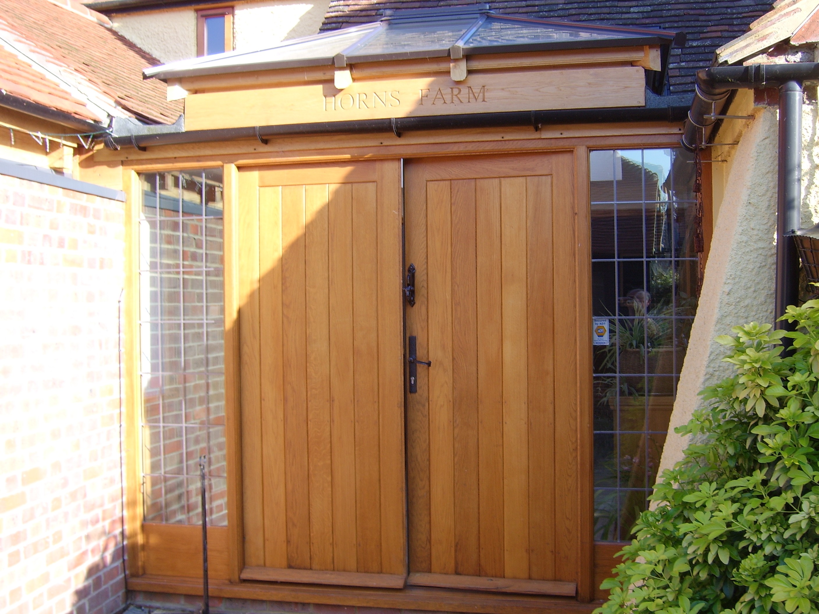 Front Door With Carved Name Plate